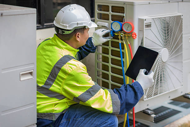 Professional Hvac technician working in Readville, MA